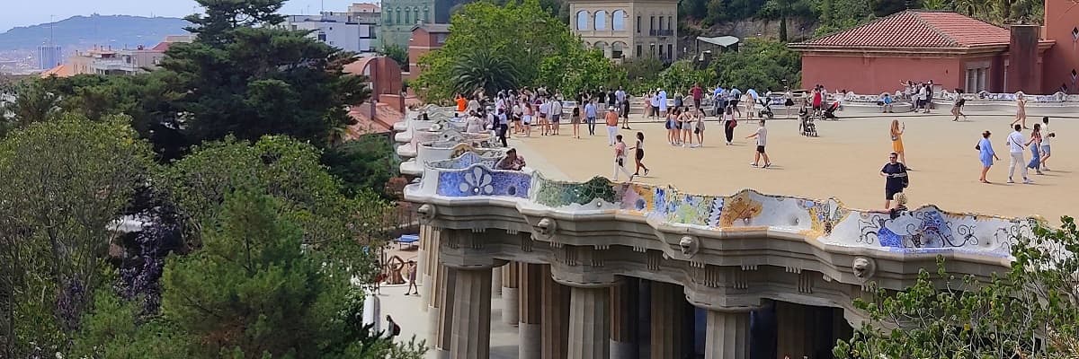 The trencadís terrace of Park Güell, above the city.