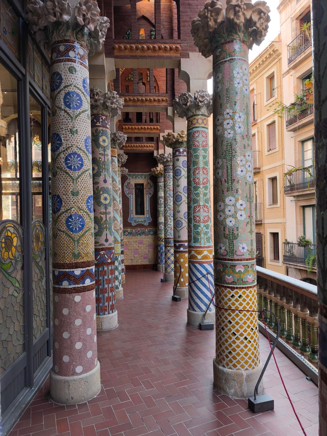 The colourful mosaic columns of the Palau de la Música Catalana’s upper façade loggia