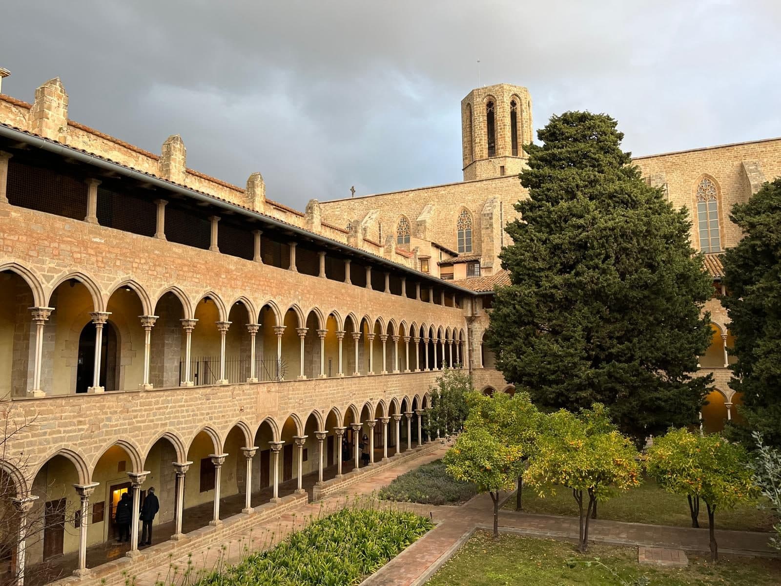 The three-storey Gothic cloister of the Monastery of Pedralbes with its garden and octagonal bell-tower
