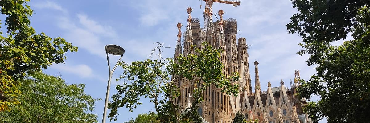 The towers of the Sagrada Família seen from the surrounding streets