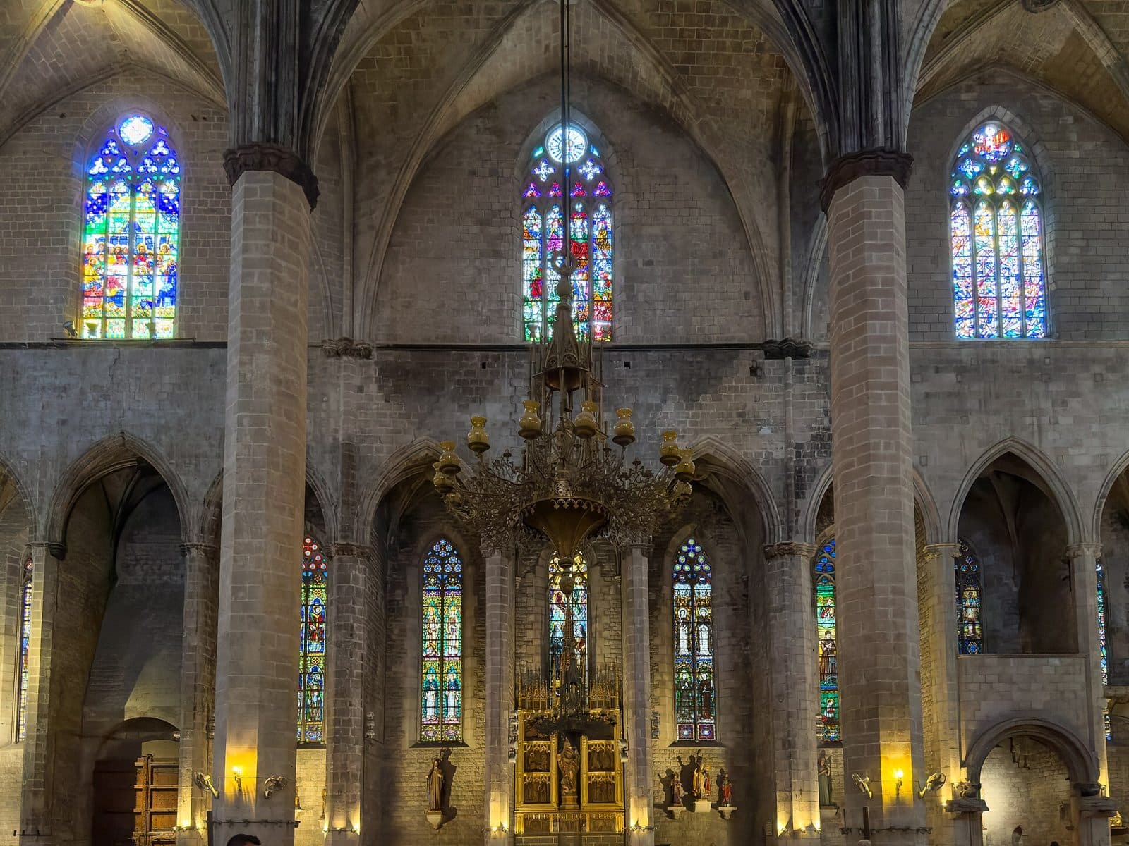 The soaring stone columns and stained-glass windows inside the basilica of Santa Maria del Mar