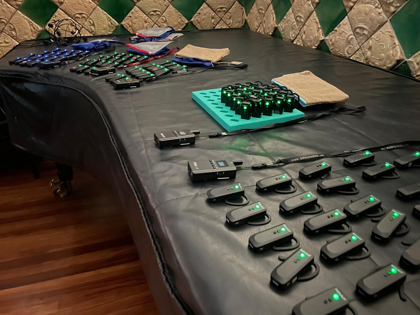 Radioguide receivers prepared and paired for a group