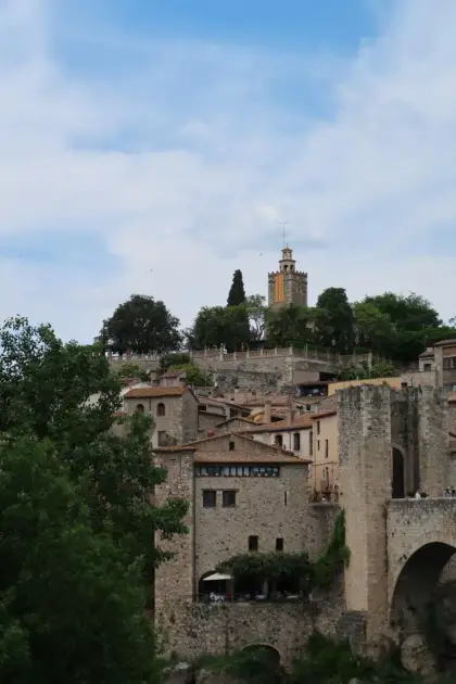 The Besalú skyline, bridge tower and church rising together