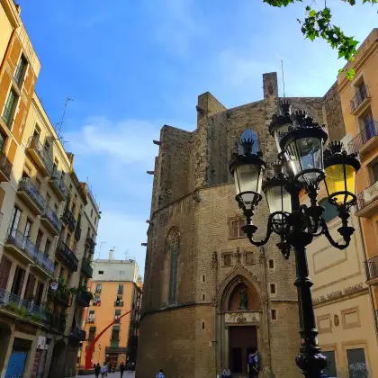 The apse of Santa Maria del Mar beside an ornate street lantern