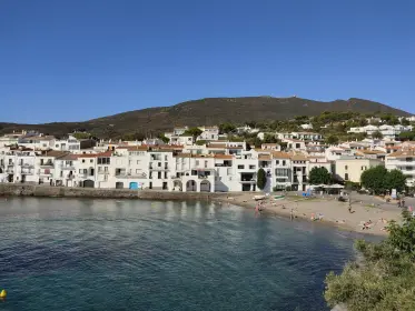 The village stepping down to its beach, seen across the bay