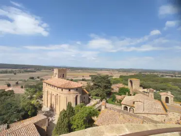 Terracotta rooftops giving onto the open Empordà country