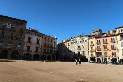 The great arcaded Plaça Major with its painted house fronts
