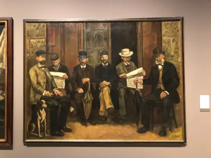 Una pintura catalana de fi de segle amb homes reunits llegint diaris