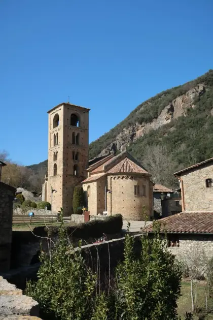 The Romanesque bell tower of Beget standing above the valley